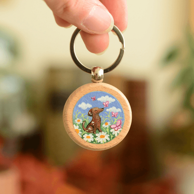 "A Doggo in the Clouds" Hand-Painted Wooden Keychain